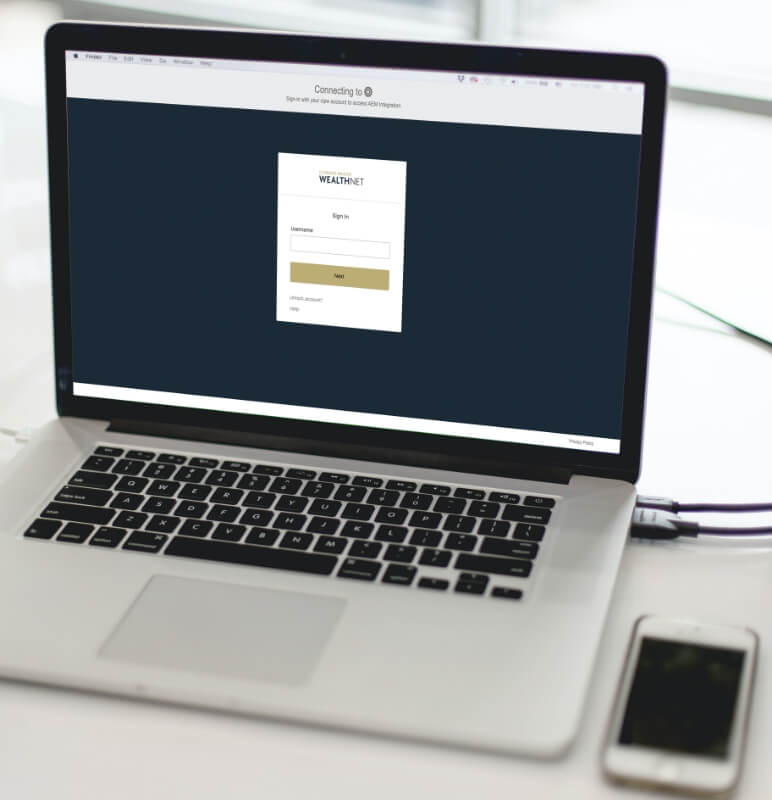 CI Financial WealthNet — login portal on laptop