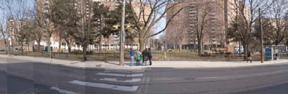 Moss Park site — streetscape with social housing towers